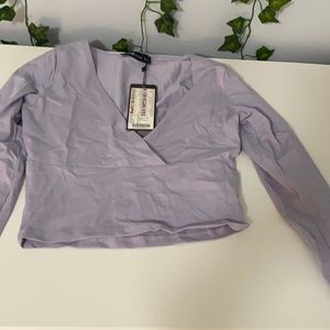 cropped light purple cross shirt
